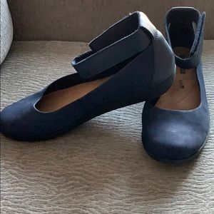 Navy blue ballet flats with ankle strap